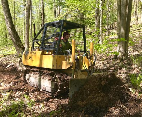 trail building machines reddit